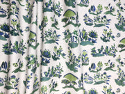 A linen fabric with a floral and fauna print, featuring various shades of blue, green, and beige. Antique Sarasa documant inspired.